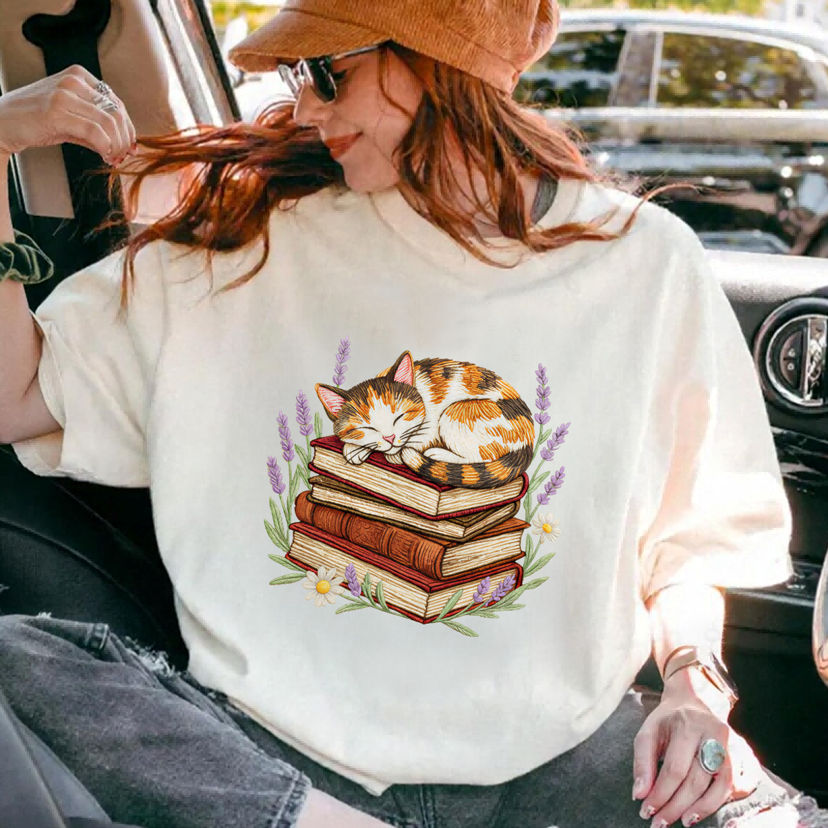 A Sleeping Kitten With Books Casual T-shirt